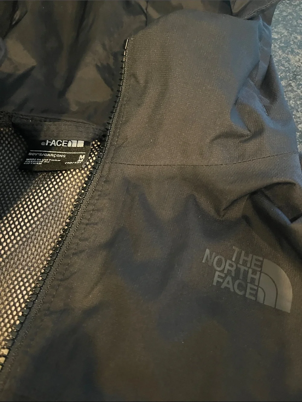 The North Face Black Kids' Hoodedu Rain Jacket with Red Accents Boys M 10/12